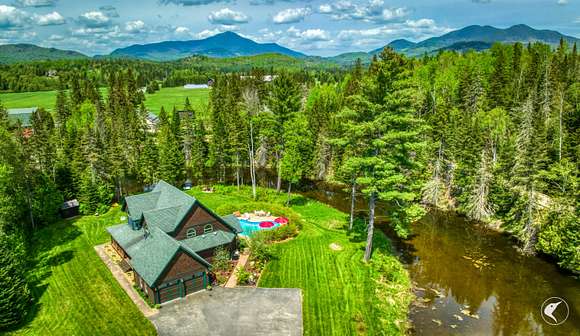 4.3 Acres of Residential Land with Home for Sale in Lake Placid, New York