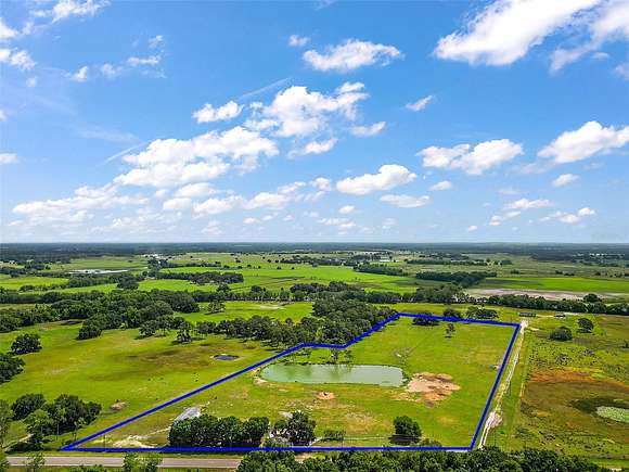 20 Acres of Recreational Land & Farm for Auction in Center Hill, Florida