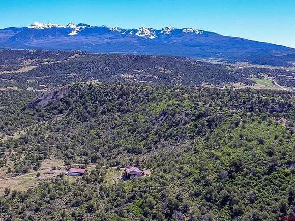 40 Acres of Agricultural Land with Home for Sale in Mancos, Colorado