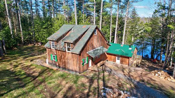21.3 Acres of Recreational Land with Home for Sale in Palmyra, Maine