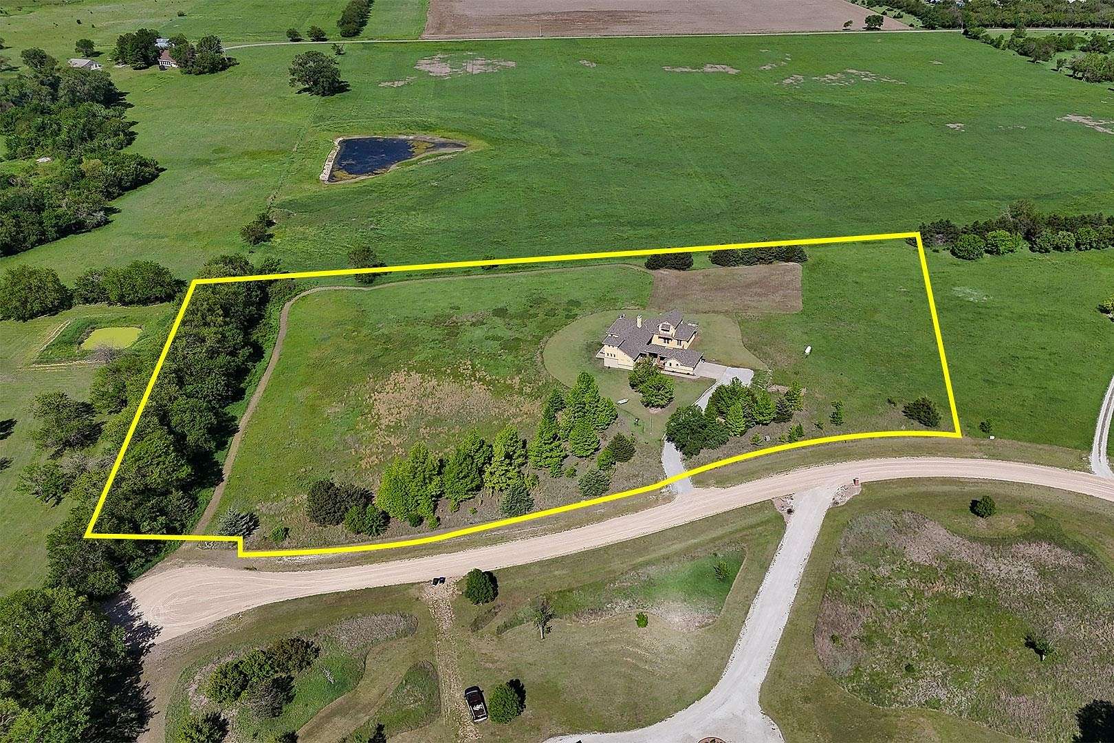6.1 Acres of Residential Land with Home for Auction in Valley Center, Kansas