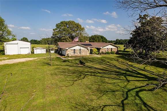 38.2 Acres of Agricultural Land with Home for Sale in Detroit, Texas