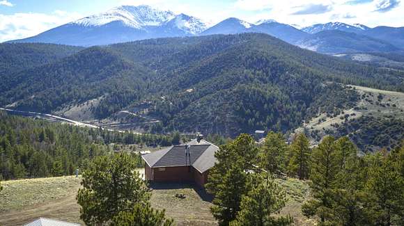 27 Acres of Recreational Land with Home for Sale in Salida, Colorado