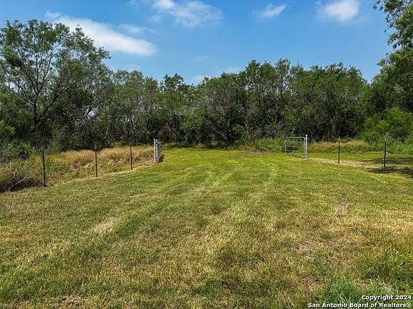 11.068 Acres of Land for Sale in Devine, Texas