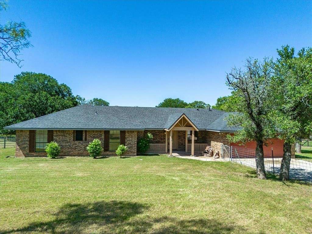 2 Acres of Residential Land with Home for Sale in Springtown, Texas