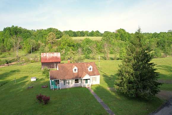 27 Acres of Land with Home for Auction in Liberty, Kentucky