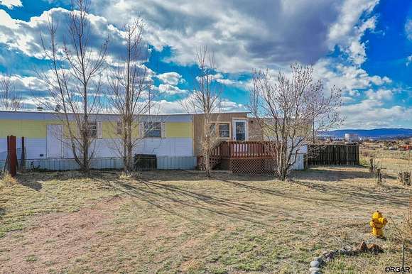 2.5 Acres of Residential Land with Home for Sale in Florence, Colorado