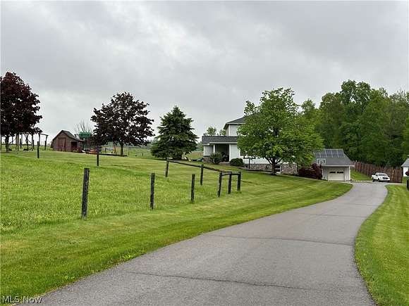 3.9 Acres of Residential Land with Home for Sale in Holmesville, Ohio