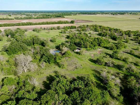 153 Acres of Improved Land for Sale in Wolfe City, Texas