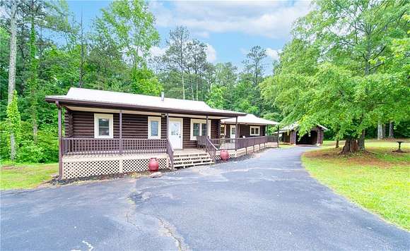 14.21 Acres of Land with Home for Sale in Roopville, Georgia