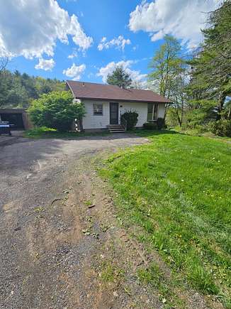 20.83 Acres of Land with Home for Sale in Surprise, New York
