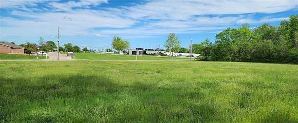1.2 Acres of Commercial Land for Sale in Peculiar, Missouri