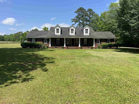 15.7 Acres of Land with Home for Sale in Aynor, South Carolina