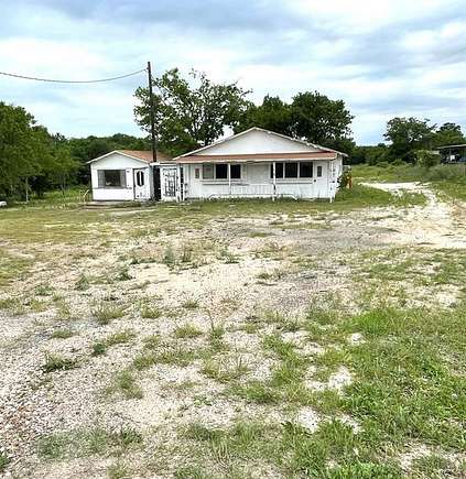 2.2 Acres of Residential Land with Home for Sale in Tom Bean, Texas