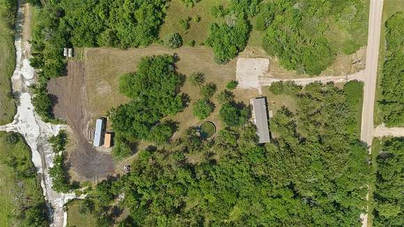 8 Acres of Residential Land with Home for Sale in Honey Grove, Texas