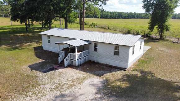 18.2 Acres of Land with Home for Sale in Fort White, Florida