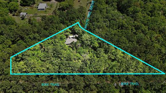 5.3 Acres of Residential Land with Home for Sale in Crawfordville, Florida