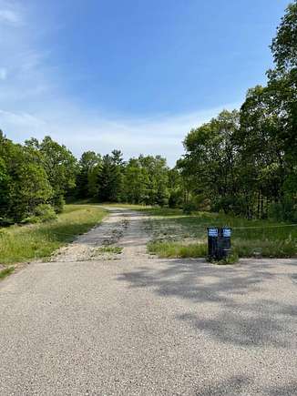 9.5 Acres of Commercial Land for Sale in Manistee, Michigan
