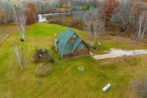 30 Acres of Recreational Land with Home for Sale in Blanchard, Michigan