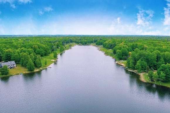 0.55 Acres of Residential Land for Sale in Canadian Lakes, Michigan