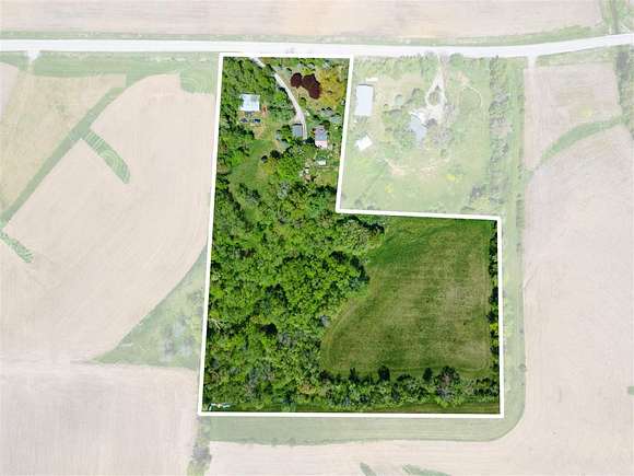9.8 Acres of Residential Land with Home for Sale in Scott Township, Iowa
