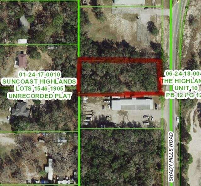 0.88 Acres of Mixed-Use Land for Sale in Spring Hill, Florida