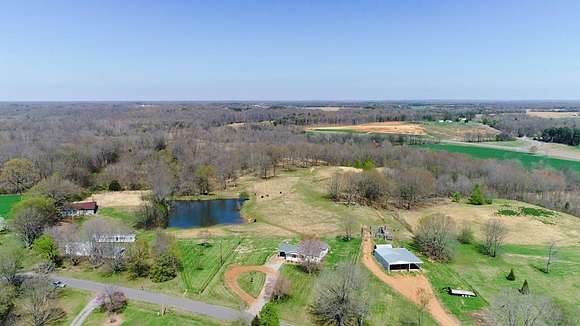 30.8 Acres of Land with Home for Sale in Almo, Kentucky