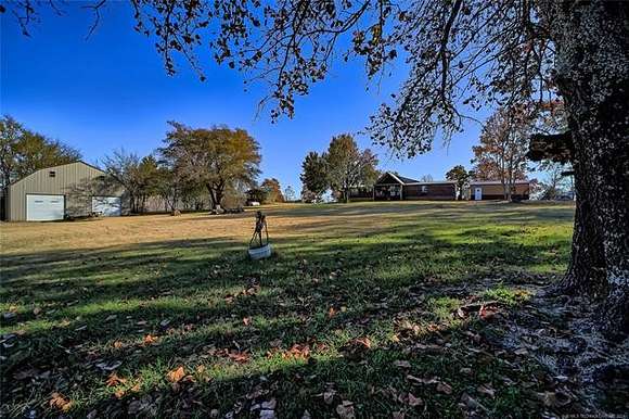 6.3 Acres of Residential Land with Home for Sale in Checotah, Oklahoma