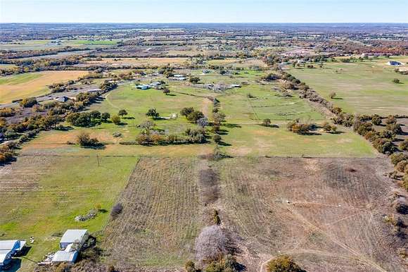 25 Acres of Agricultural Land with Home for Sale in Poolville, Texas