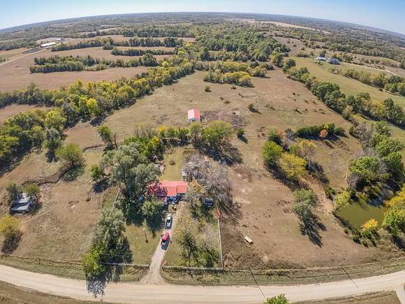 23 Acres of Agricultural Land with Home for Sale in Spickard, Missouri