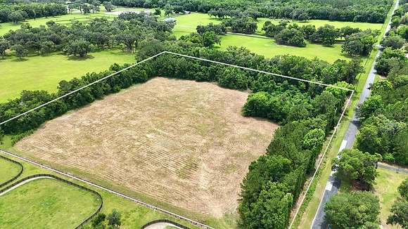10 Acres of Residential Land with Home for Sale in Reddick, Florida