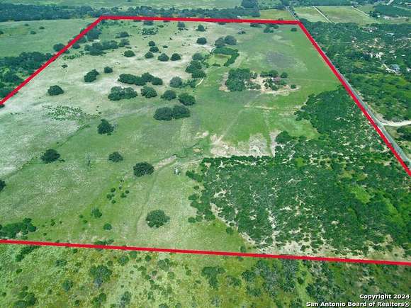 105 Acres of Agricultural Land with Home for Sale in Poteet, Texas
