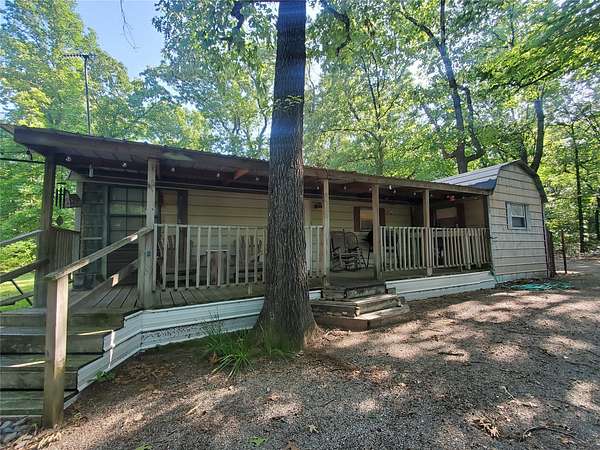 4.64 Acres of Land with Home for Sale in Honey Grove, Texas
