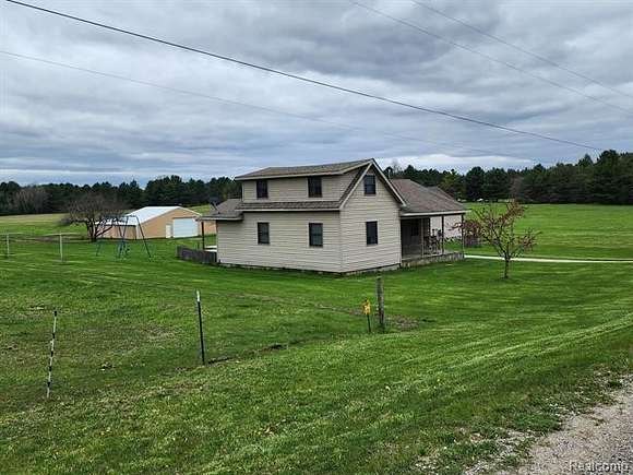 30 Acres of Agricultural Land with Home for Sale in Atlanta, Michigan