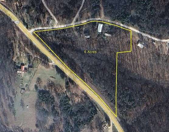 6 Acres of Residential Land with Home for Auction in Reeds Spring, Missouri