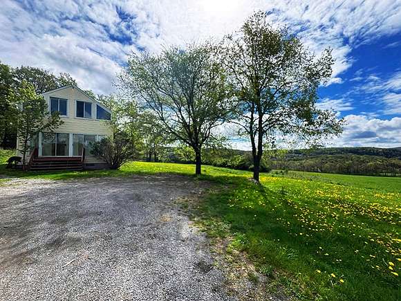 20.7 Acres of Land with Home for Sale in Hartwick, New York