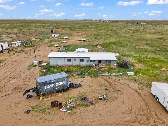 60 Acres of Agricultural Land with Home for Sale in Avondale, Colorado