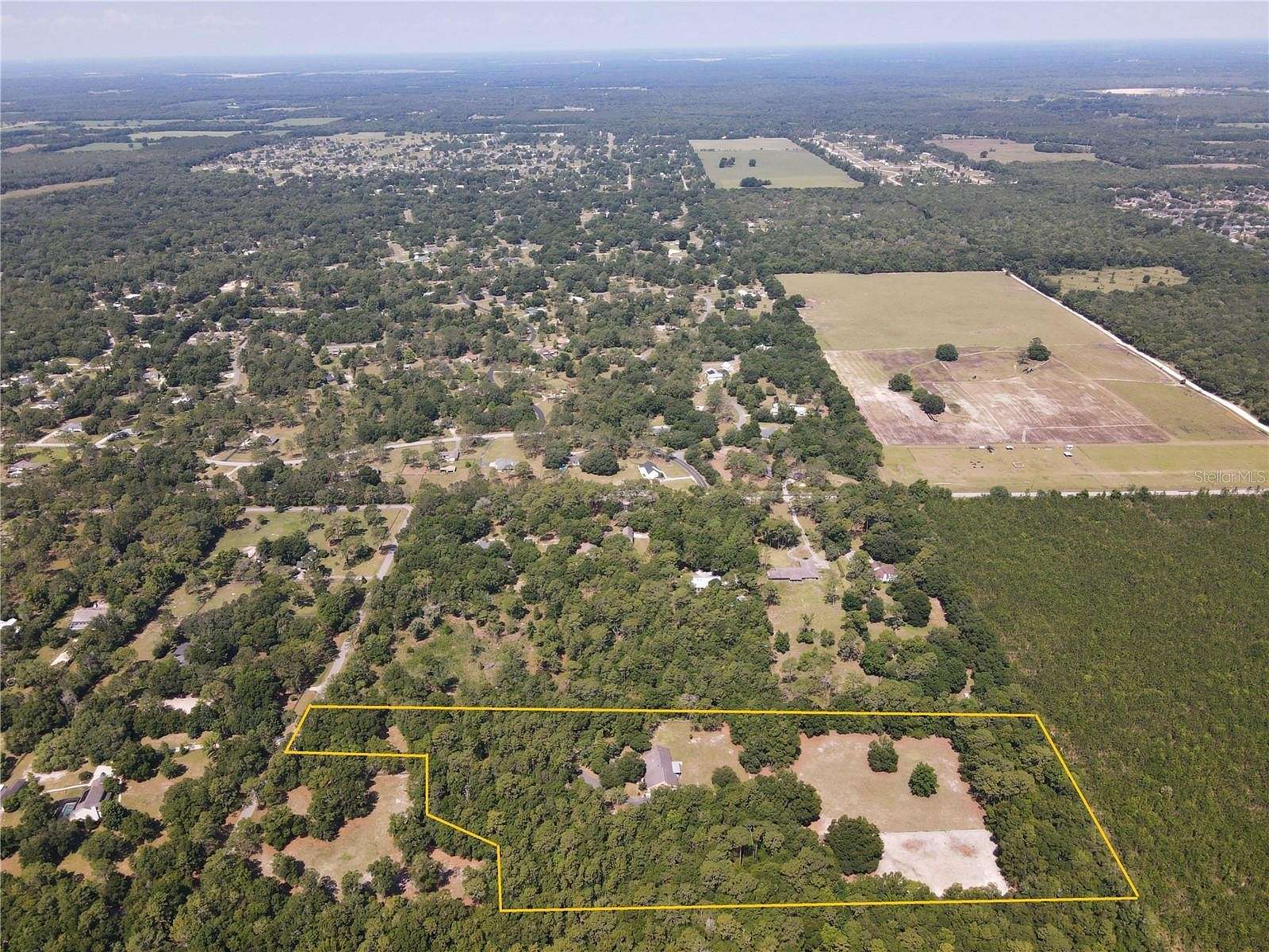 9.1 Acres of Residential Land with Home for Sale in Gainesville, Florida