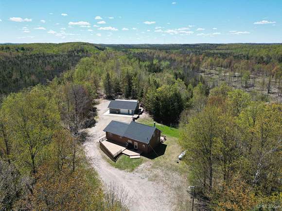 200 Acres of Recreational Land with Home for Sale in Powers, Michigan