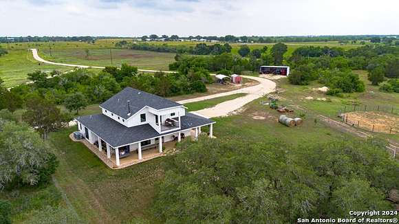 51.7 Acres of Agricultural Land with Home for Sale in Seguin, Texas