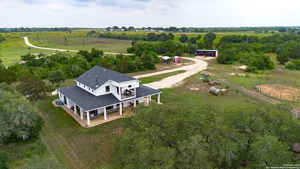 51.7 Acres of Agricultural Land with Home for Sale in Seguin, Texas