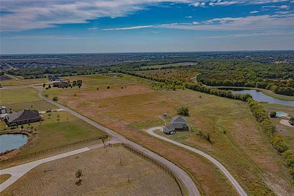 10 Acres of Residential Land with Home for Sale in McLendon-Chisholm, Texas