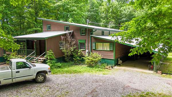 5 Acres of Residential Land with Home for Sale in Summertown, Tennessee