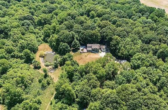 24 Acres of Land with Home for Sale in Lawrence, Michigan
