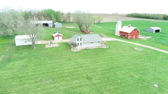11.2 Acres of Land with Home for Auction in Doon, Iowa