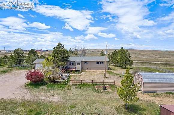 77.3 Acres of Agricultural Land with Home for Sale in Calhan, Colorado