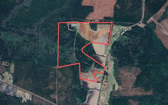 65.3 Acres of Land with Home for Sale in Maple Hill, North Carolina