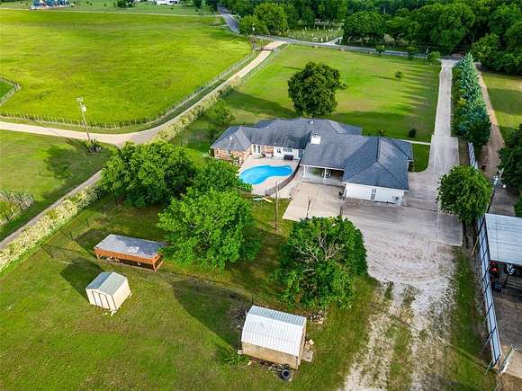 3.1 Acres of Residential Land with Home for Sale in Pecan Hill, Texas