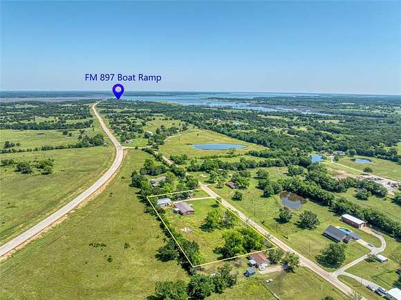 2.4 Acres of Residential Land with Home for Sale in Dodd City, Texas