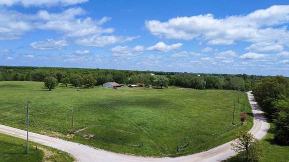 36 Acres of Agricultural Land with Home for Auction in Cairo, Missouri